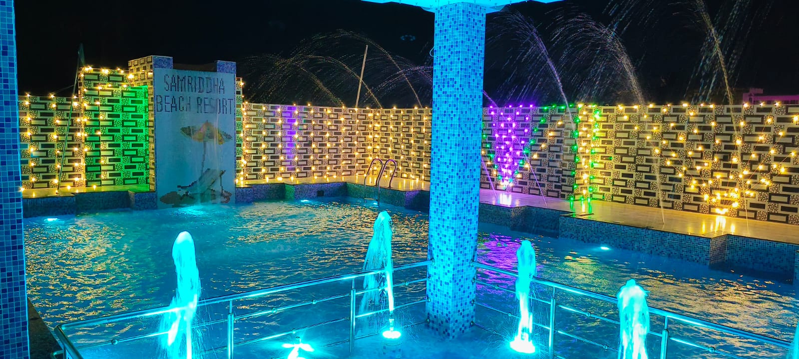 Samriddha Beach Resort Night Pool Panorama and Illuminated Fountains